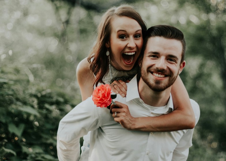 Joyful married couple outdoors